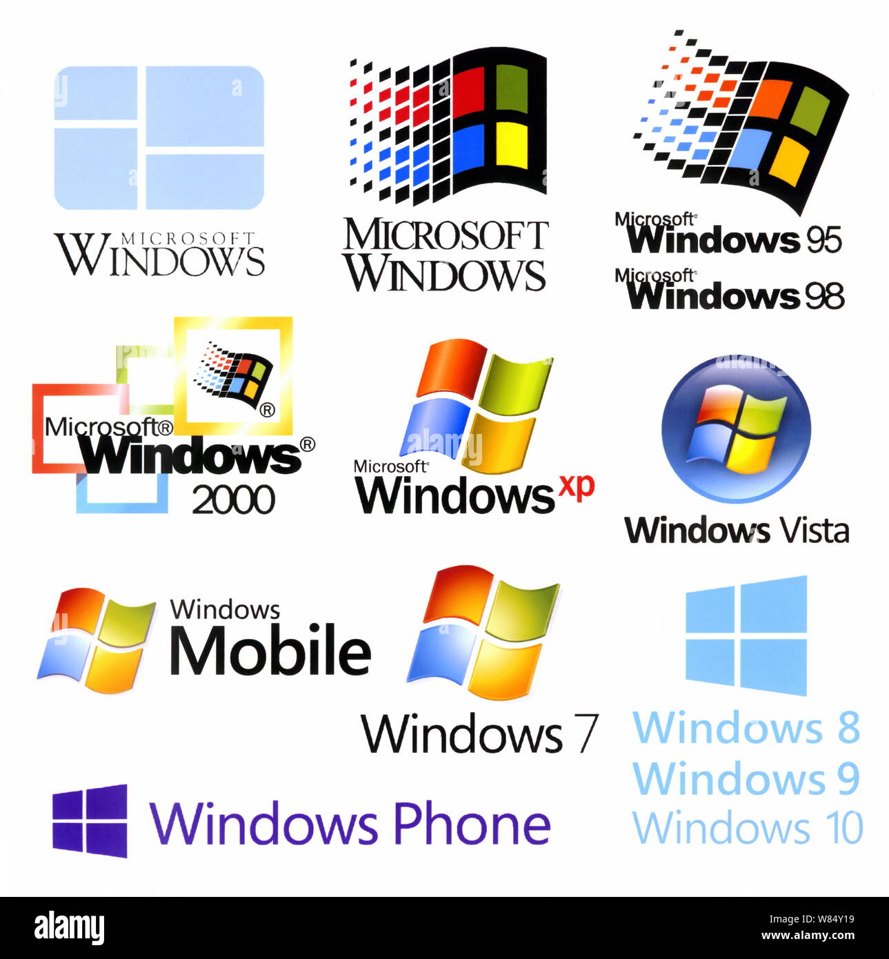 Evoluzione di Windows logotipi, stampato su carta bianca Foto Stock