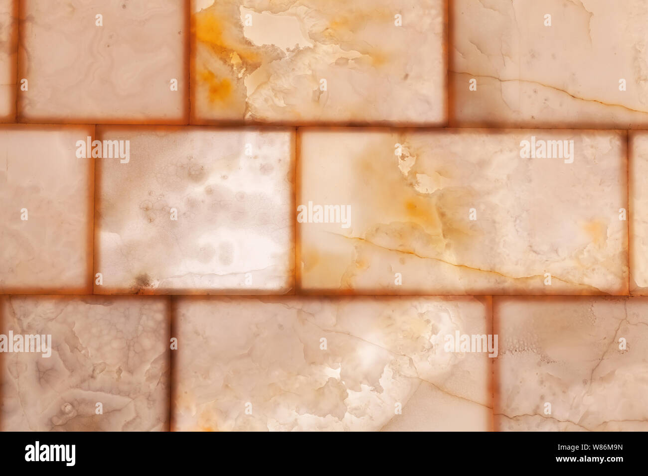 Rosa naturale onyx decorativo pannelli di parete con retro illuminazione accesa, close-up foto di sfondo texture Foto Stock