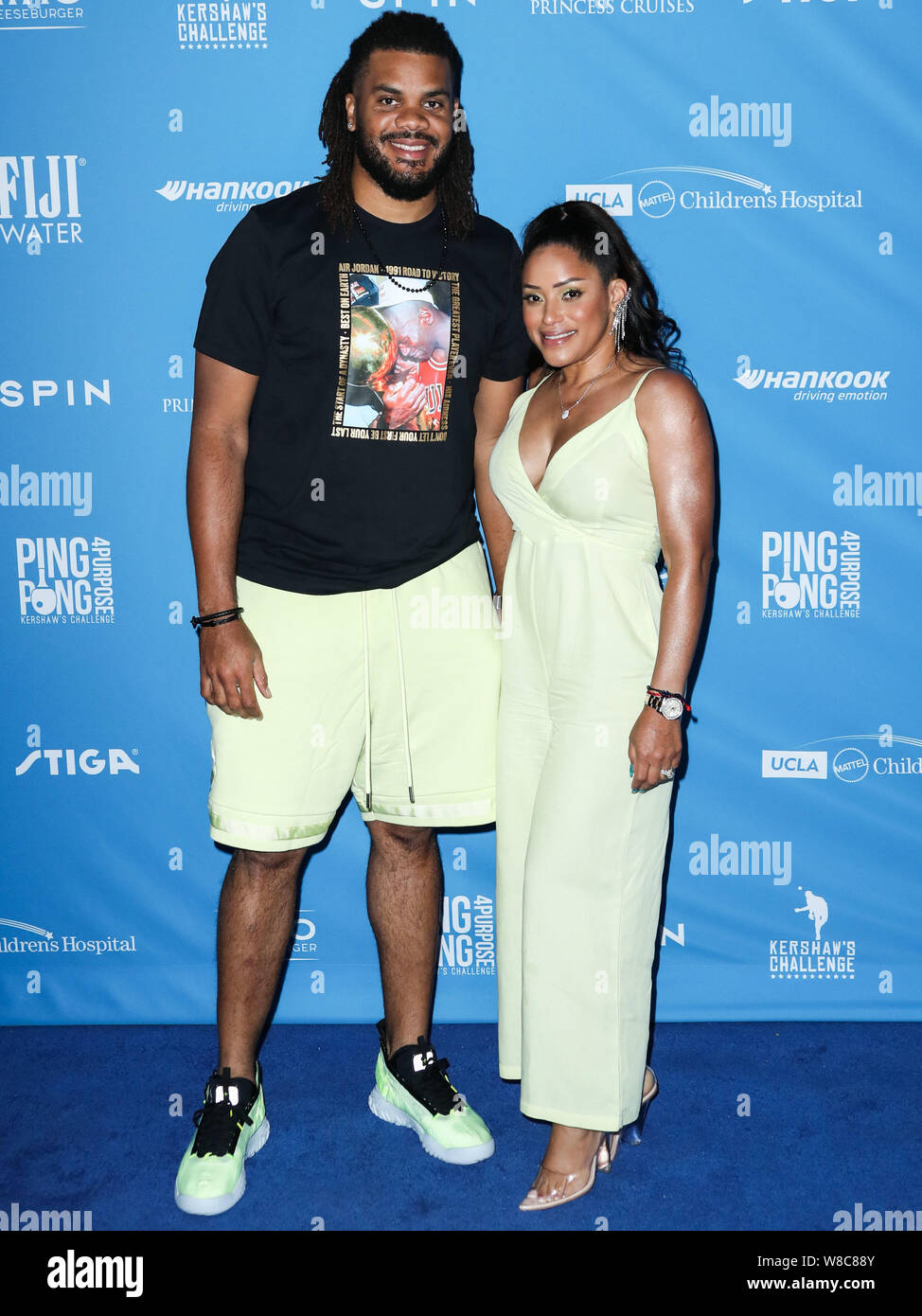 Los Angeles, Stati Uniti. 08 Ago, 2019. LOS ANGELES, CALIFORNIA, STATI UNITI D'AMERICA - agosto 08: Professional baseball pitcher Kenley Jansen e la moglie di Gianni Jansen arriva a Clayton Kershaw del settimo annuale di Ping Pong 4 Scopo finalizzata alla raccolta di fondi presso il Dodger Stadium il 8 agosto 2019 a Los Angeles, California, Stati Uniti. (Foto di Xavier COLLIN/Image Press Agency) Credito: Image Press Agency/Alamy Live News Foto Stock