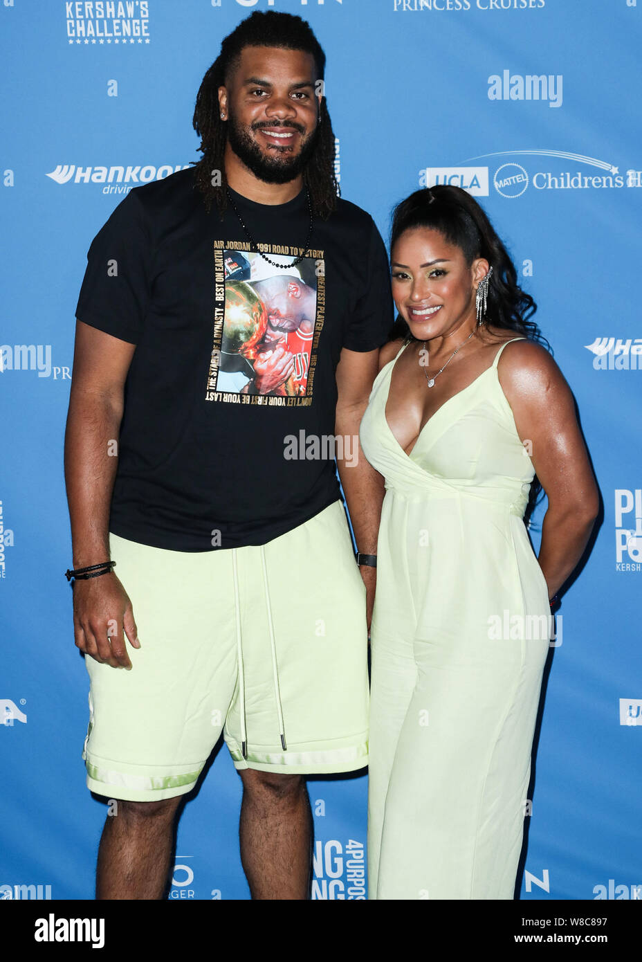 Los Angeles, Stati Uniti. 08 Ago, 2019. LOS ANGELES, CALIFORNIA, STATI UNITI D'AMERICA - agosto 08: Professional baseball pitcher Kenley Jansen e la moglie di Gianni Jansen arriva a Clayton Kershaw del settimo annuale di Ping Pong 4 Scopo finalizzata alla raccolta di fondi presso il Dodger Stadium il 8 agosto 2019 a Los Angeles, California, Stati Uniti. (Foto di Xavier COLLIN/Image Press Agency) Credito: Image Press Agency/Alamy Live News Foto Stock