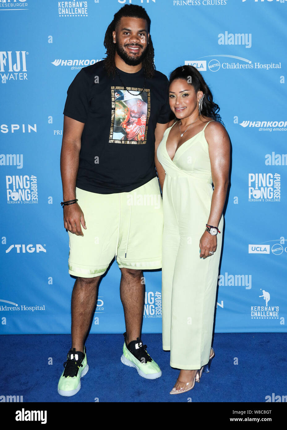 LOS ANGELES, CALIFORNIA, STATI UNITI D'AMERICA - agosto 08: Professional baseball pitcher Kenley Jansen e la moglie di Gianni Jansen arriva a Clayton Kershaw del settimo annuale di Ping Pong 4 Scopo finalizzata alla raccolta di fondi presso il Dodger Stadium il 8 agosto 2019 a Los Angeles, California, Stati Uniti. (Foto di Xavier COLLIN/Image Press Agency) Foto Stock