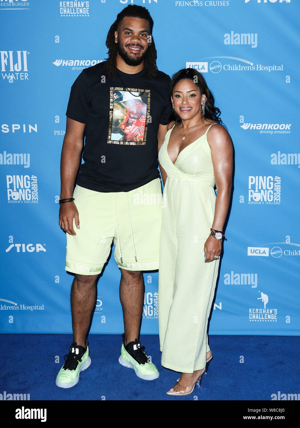 LOS ANGELES, CALIFORNIA, STATI UNITI D'AMERICA - agosto 08: Professional baseball pitcher Kenley Jansen e la moglie di Gianni Jansen arriva a Clayton Kershaw del settimo annuale di Ping Pong 4 Scopo finalizzata alla raccolta di fondi presso il Dodger Stadium il 8 agosto 2019 a Los Angeles, California, Stati Uniti. (Foto di Xavier COLLIN/Image Press Agency) Foto Stock