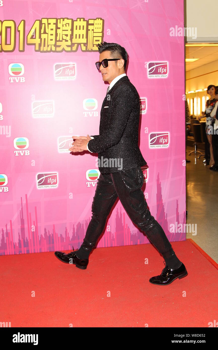 Hong Kong cantante Aaron Kwok arriva a 2014 IFPI Hong Kong Top Sales musica cerimonia di premiazione si terrà a Hong Kong, Cina, 11 marzo 2015. Foto Stock