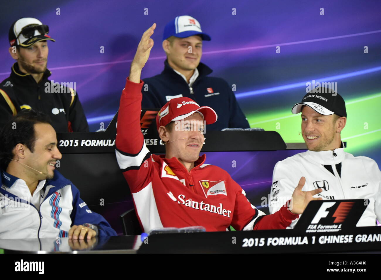 (In senso orario dalla posizione in alto a sinistra) in Francia la Romain Grosjean Lotus, svedese Marcus Ericsson della Sauber, la Gran Bretagna è Jenson Button di MaLaren, Germania Sebastián Foto Stock