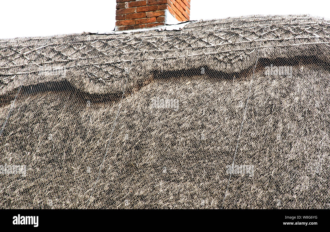 Un cottage con tetto di paglia in Wethersfield, Essex. Foto Stock