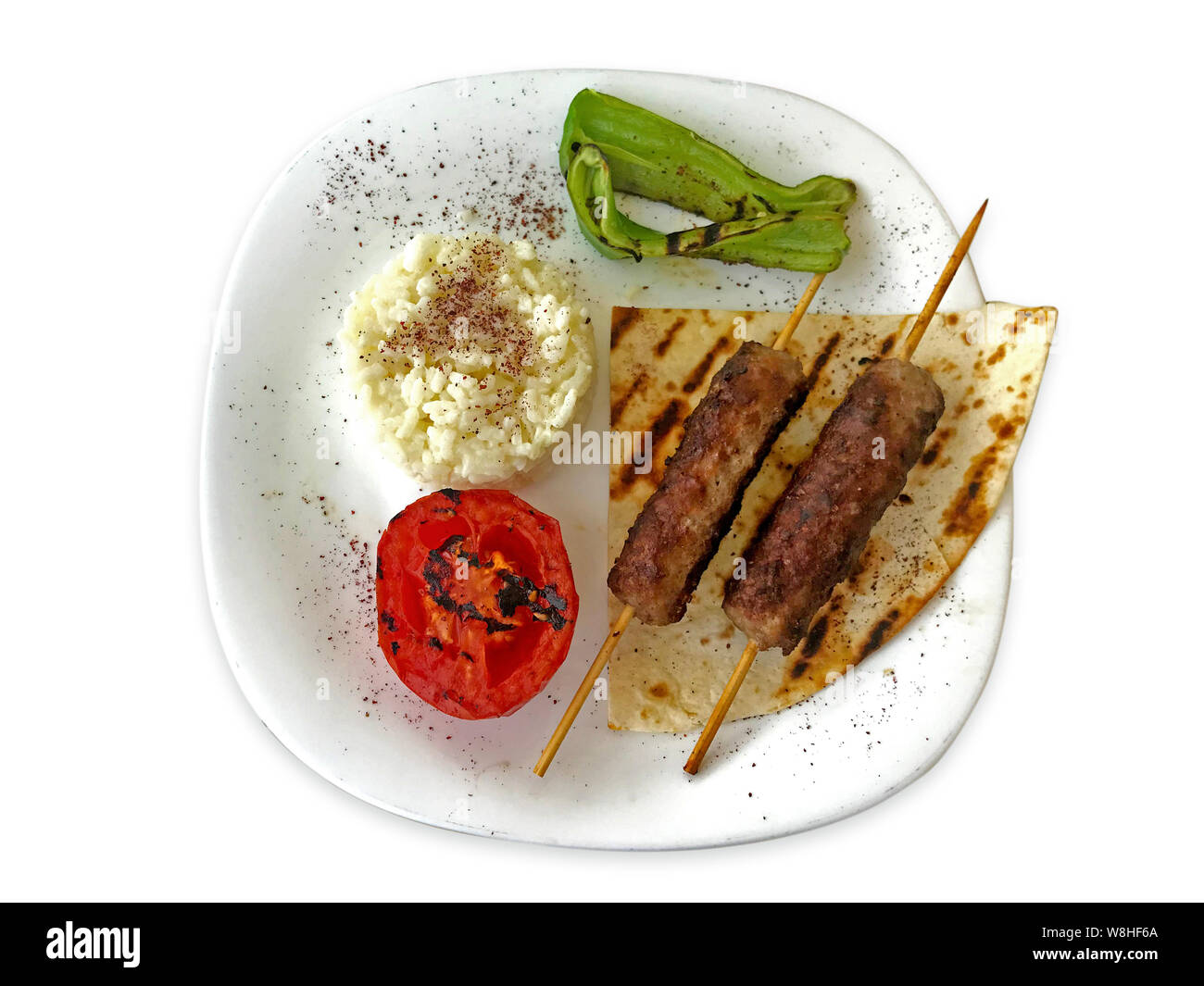 Shish kebab o Adana kebab in uno sfondo nero Foto Stock
