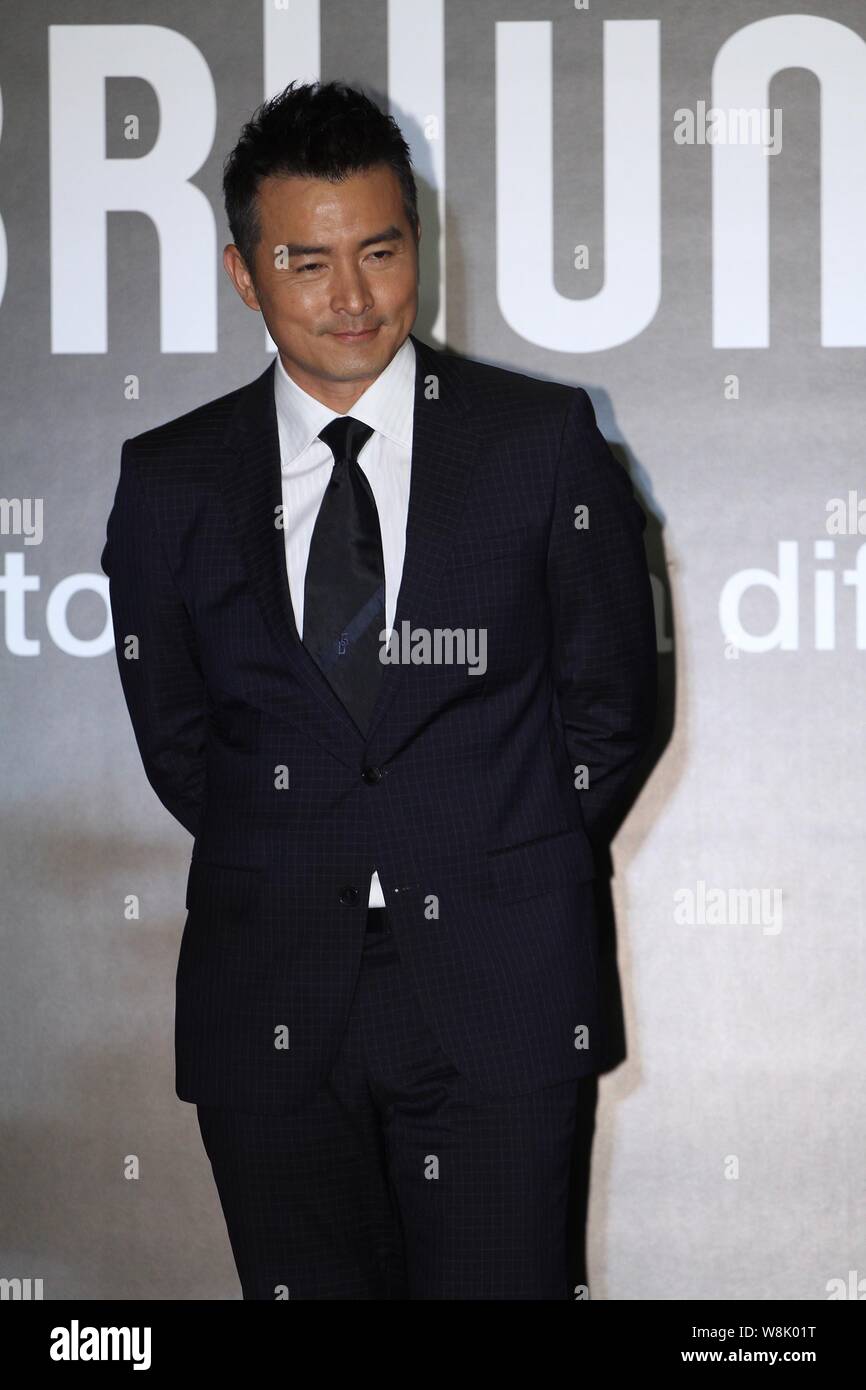 Attore di Singapore Christopher Lee Ming-shun pone in corrispondenza di un evento promozionale per la Braun rasoio elettrico a Taipei, Taiwan, 16 giugno 2015. Foto Stock