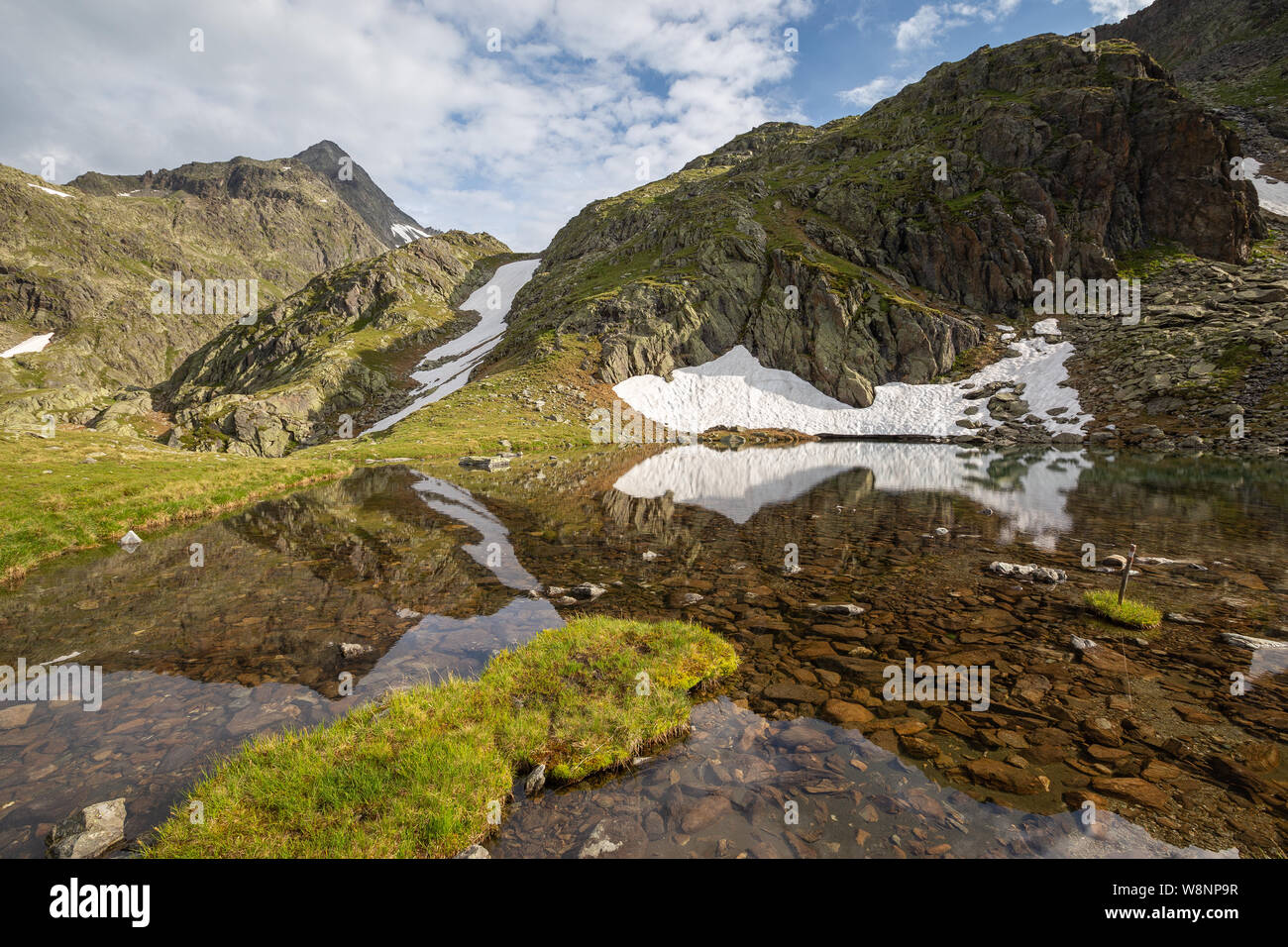 Salzplattensee. Debanttal. Picco Glodisspitze. Hohe Tauern Nationalpark. Alpi austriache. Foto Stock