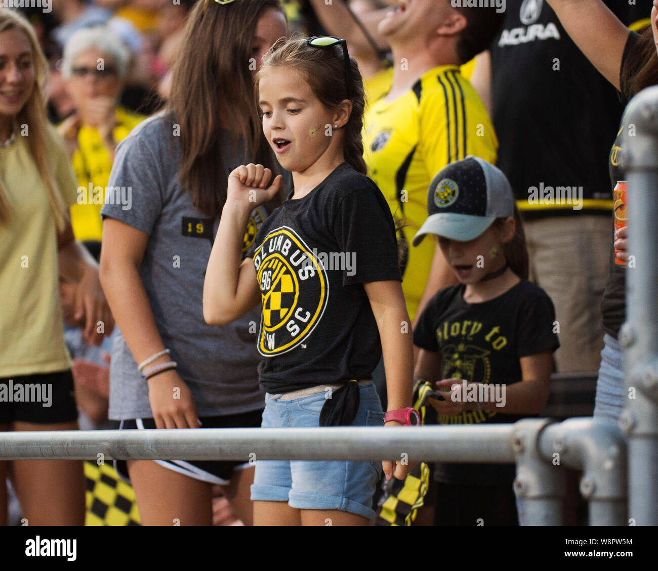 Columbus, Ohio, Stati Uniti d'America. 10 Agosto, 2019. Un giovane fan cheers Columbus Crew SC su contro FC Cincinnati nel loro gioco in Columbus, Ohio, Stati Uniti d'America. Brent Clark/Alamy Live News Foto Stock