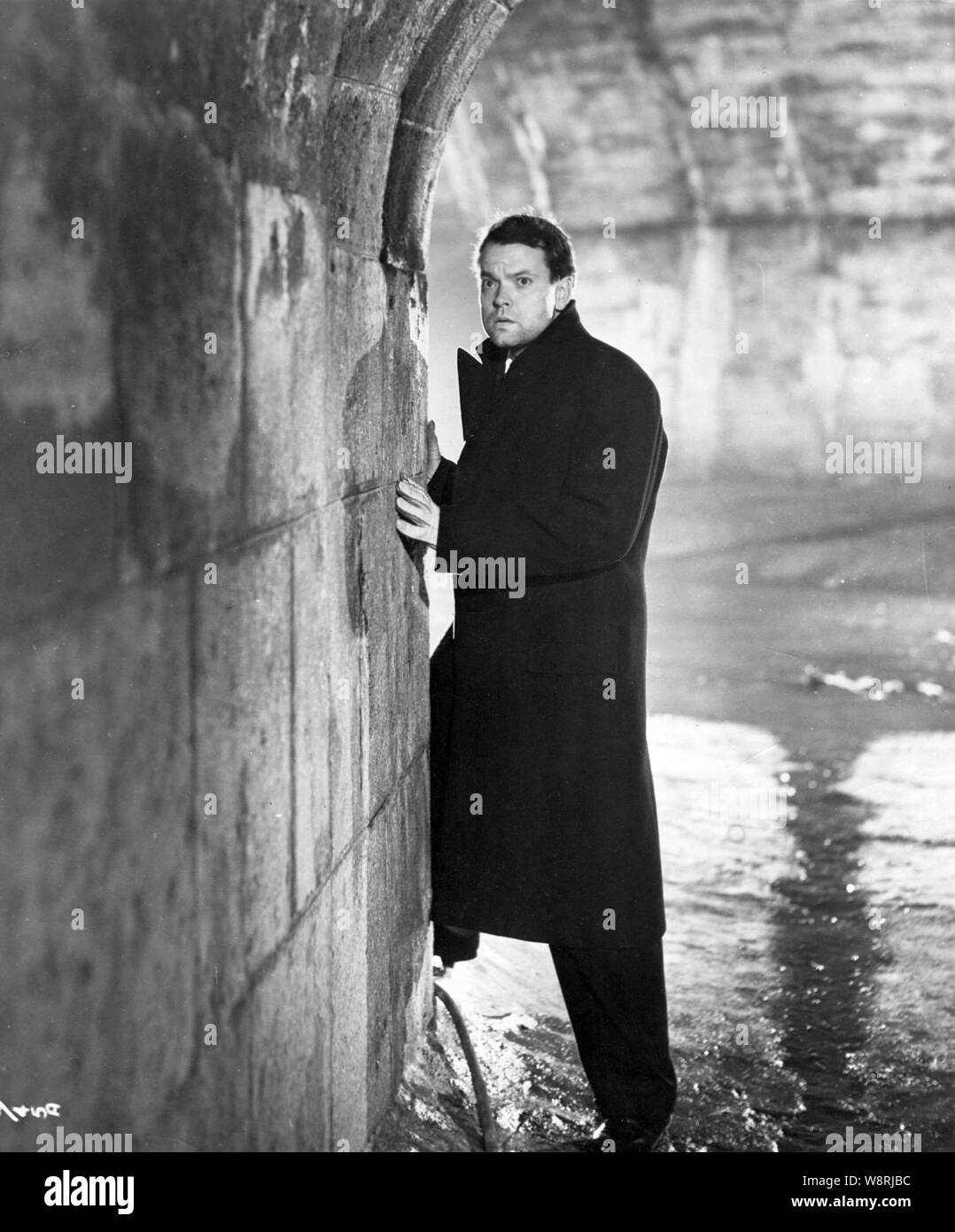 ORSON WELLES nel terzo uomo (1949), diretto da Carol Reed. Credito: London Film / Album Foto Stock