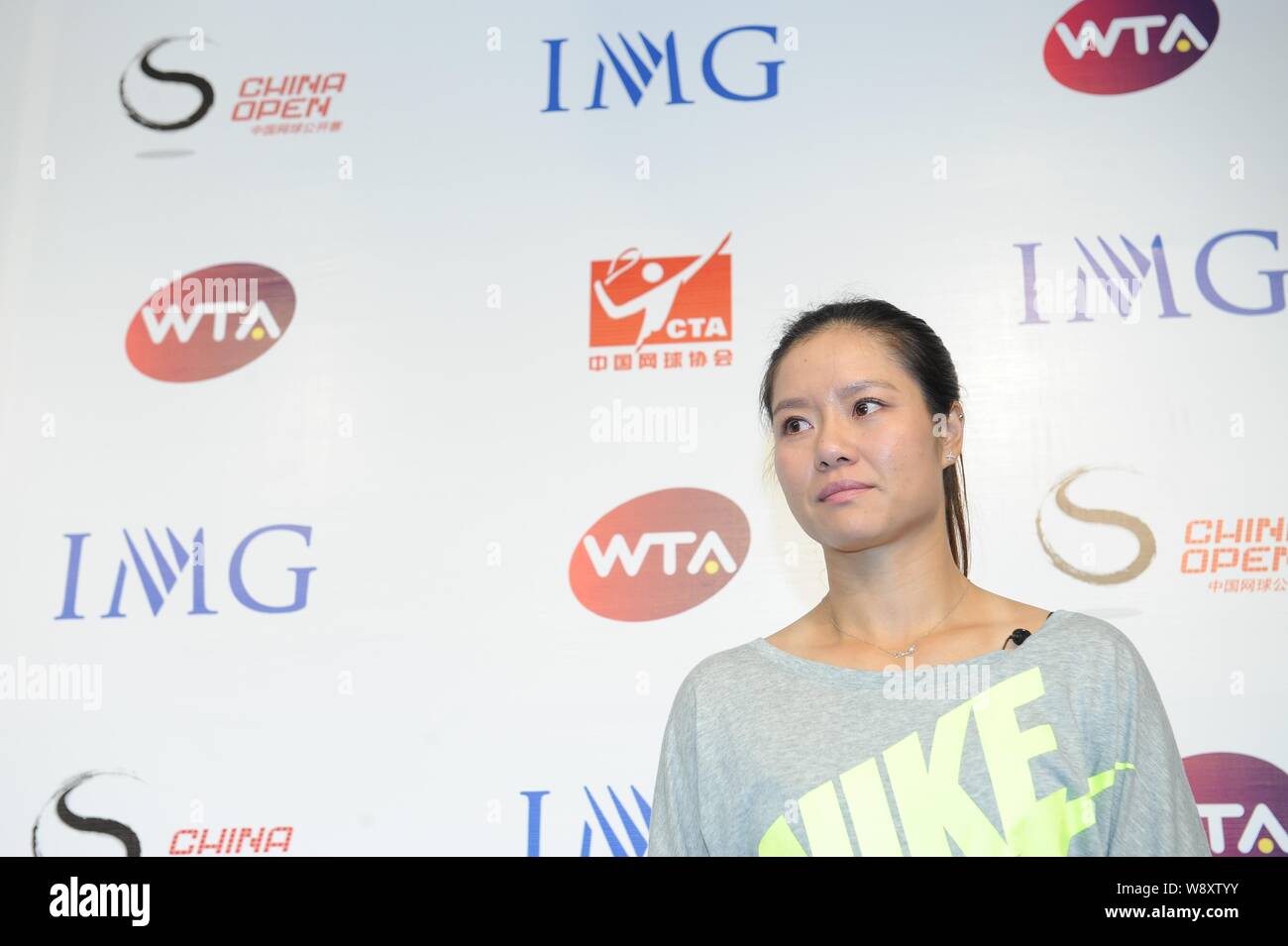 Cinese giocatore di tennis Li Na assiste la sua conferenza stampa annunciando la sua pensione a Pechino in Cina, 21 settembre 2014. Li Na, un due volte Grand SLA Foto Stock