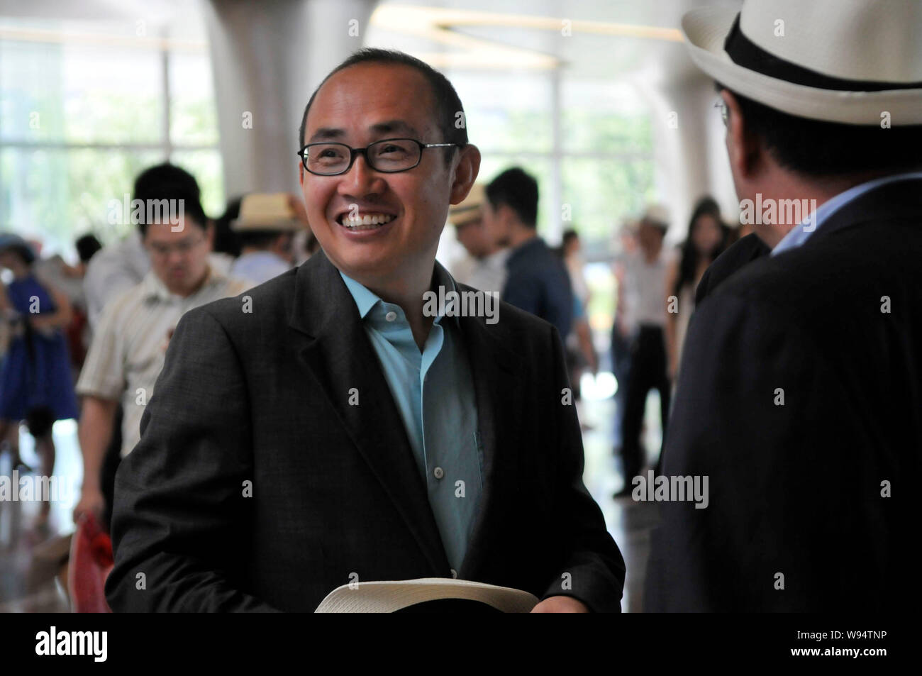 --File--Pan Shiyi, co-fondatore, Presidente e co-CEO di SOHO Cina, sorrisi durante un evento a Pechino in Cina, 25 giugno 2011. Nonostante le polemiche Foto Stock