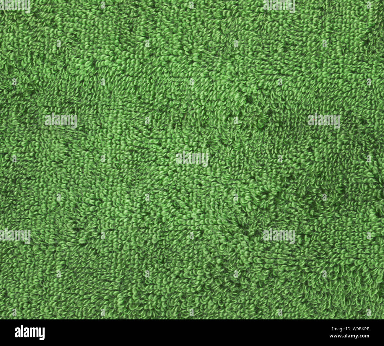 Tessuto verde sullo sfondo di asciugamani. Green towel texture Foto Stock