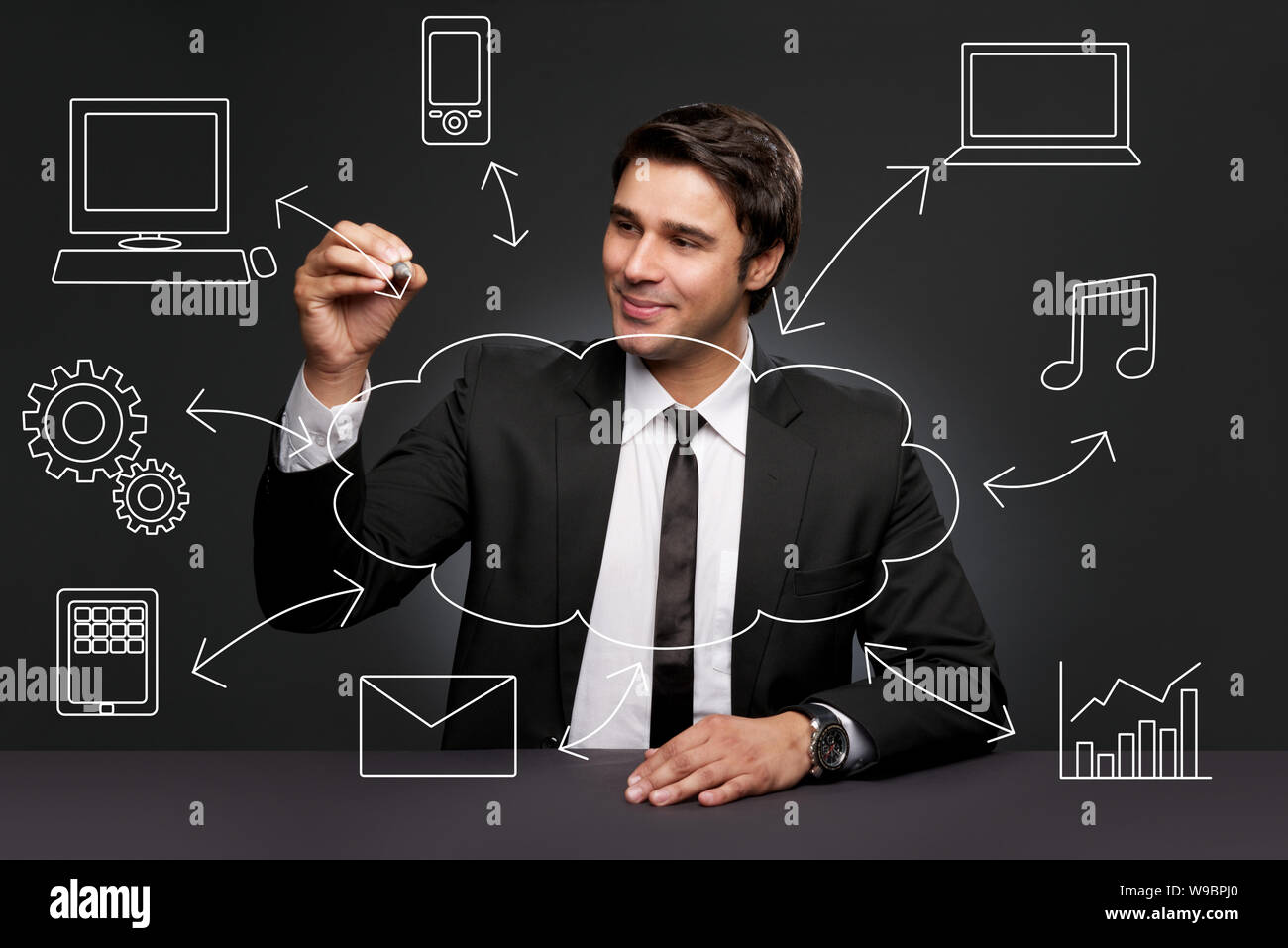 Imprenditore con il cloud computing e il concetto di connettività Foto Stock