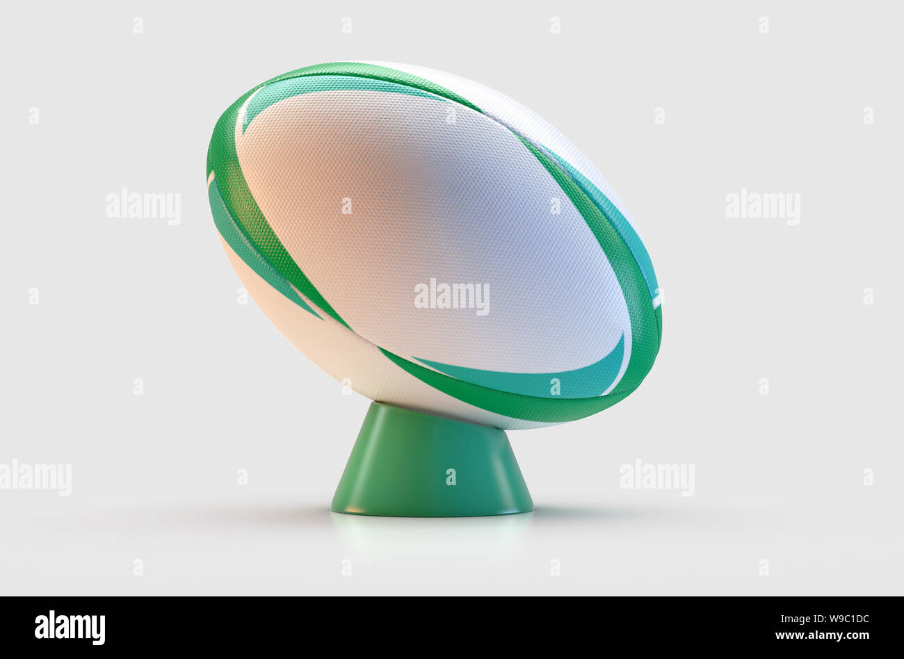 Un bianco a trama palla da rugby con un green design pattern in appoggio su di un verde kicking tee su un isolato sfondo bianco - 3D render Foto Stock