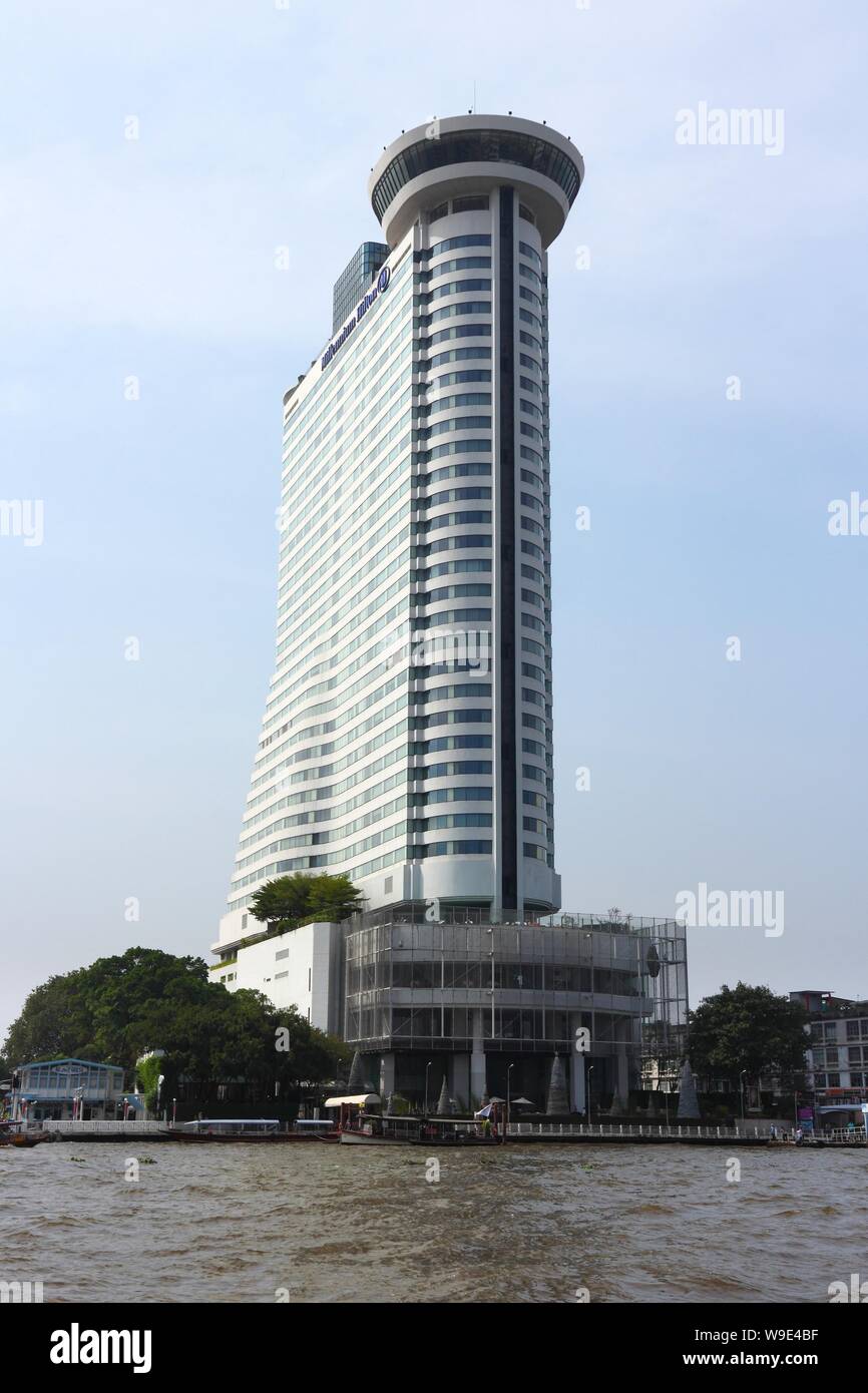 BANGKOK, Tailandia - 25 dicembre 2013: Millennium Hilton hotel di Bangkok. Hilton Worldwide ha alcune proprietà 5.200 in 105 paesi. Foto Stock