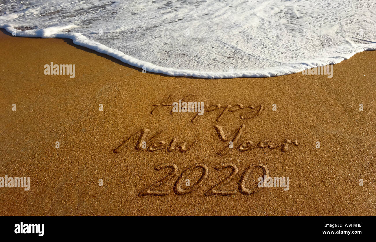 2020 Felice Anno Nuovo testo sabbia. Foto immagine Foto Stock