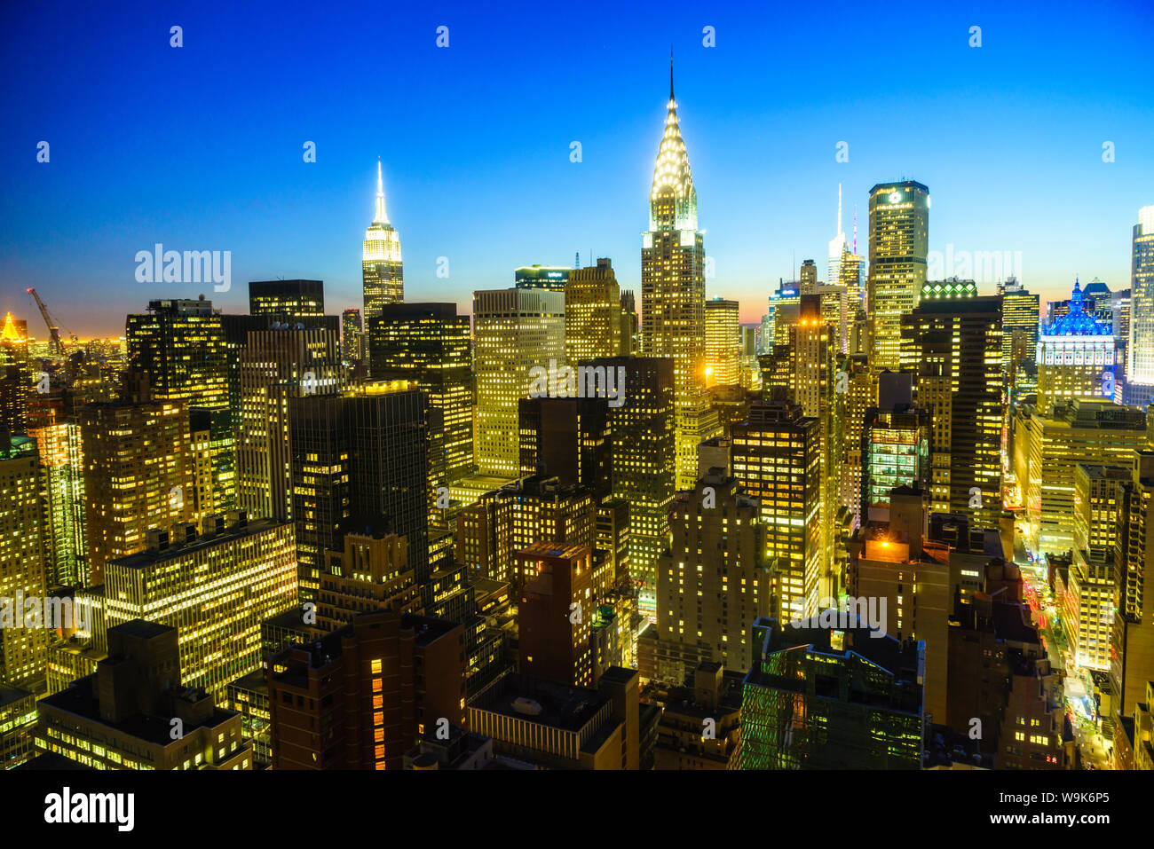 L'Empire State Building e Chrysler edifici, skyline di Manhattan al crepuscolo, New York City, Stati Uniti d'America, America del Nord Foto Stock