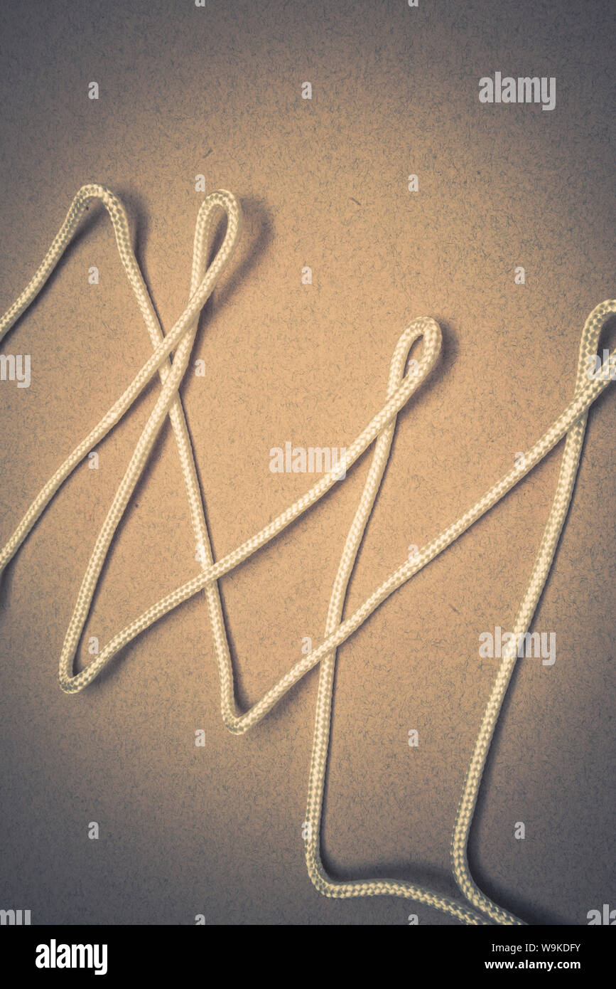 Bianco in modo casuale di corda di cui a zig zag Foto Stock
