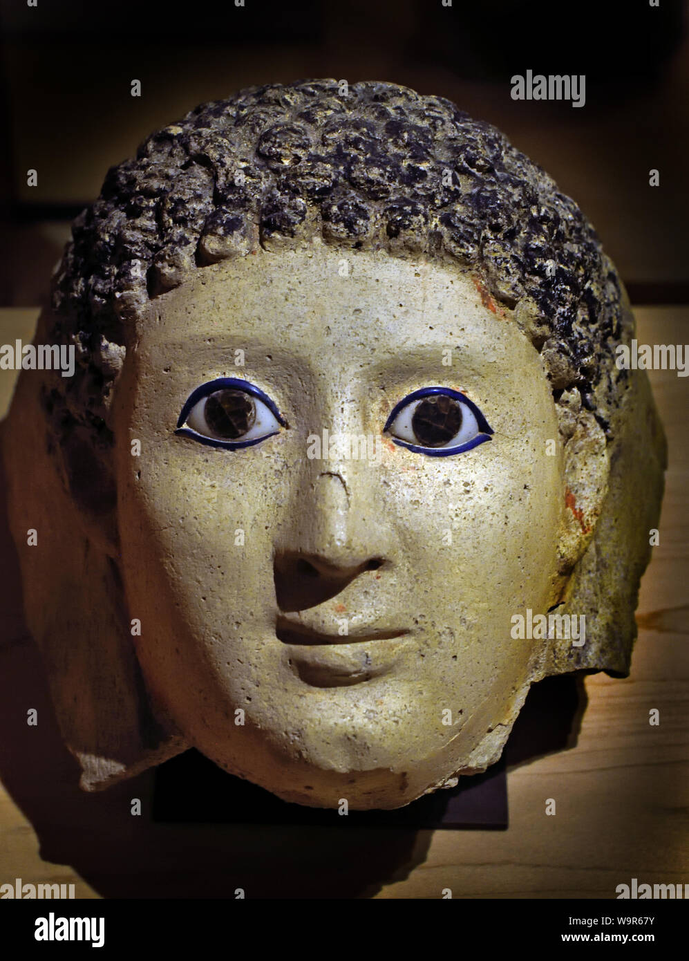 Ragazzo maschera del I secolo d.c. Egitto stucco verniciato, vetro.la maschera di mummie, Egitto, egiziano. Foto Stock