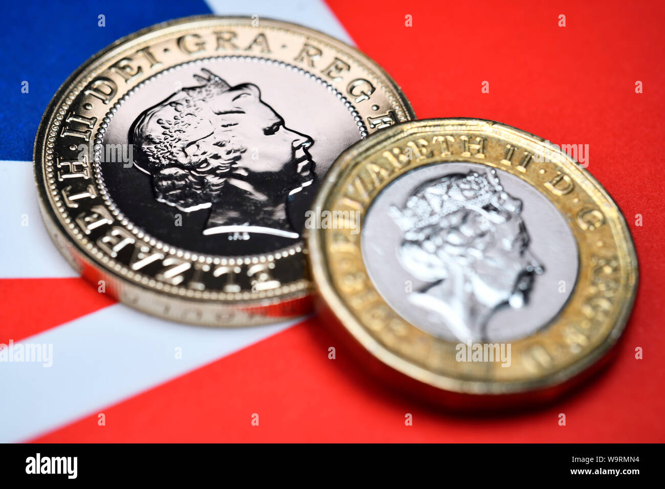 Sterlina inglese delle monete in euro Foto Stock