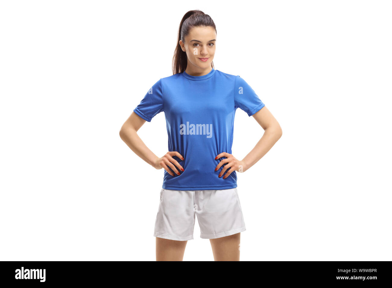 Femmina giovane giocatore di calcio in posa isolati su sfondo bianco Foto Stock
