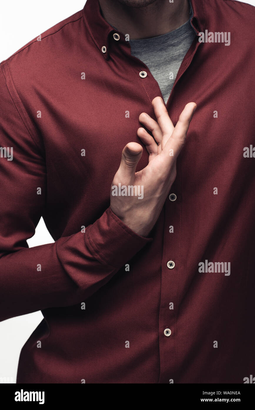 Vista parziale dell'uomo gesti con le mani mentre si utilizza il linguaggio del corpo isolato sul grigio, emozioni umane e concetto di espressione Foto Stock