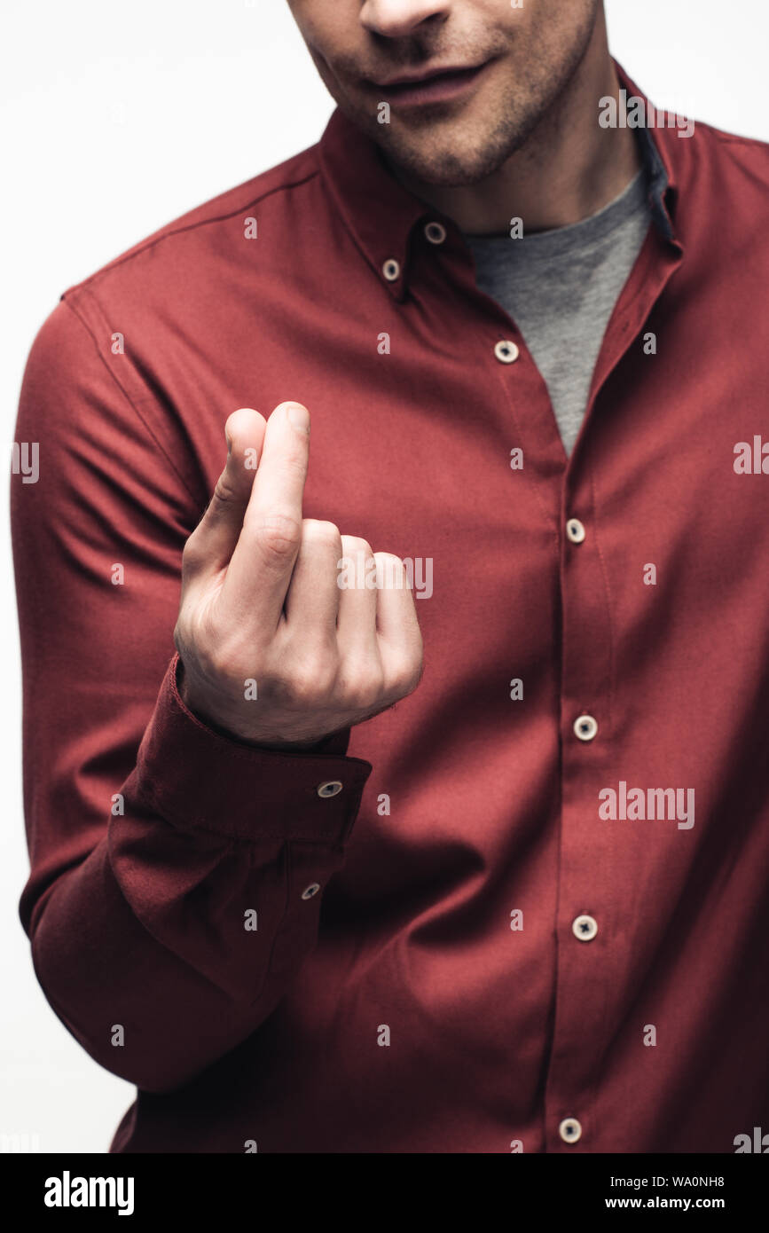 Vista ritagliata dell uomo che mostra il denaro gesto isolato sul grigio, emozioni umane e concetto di espressione Foto Stock