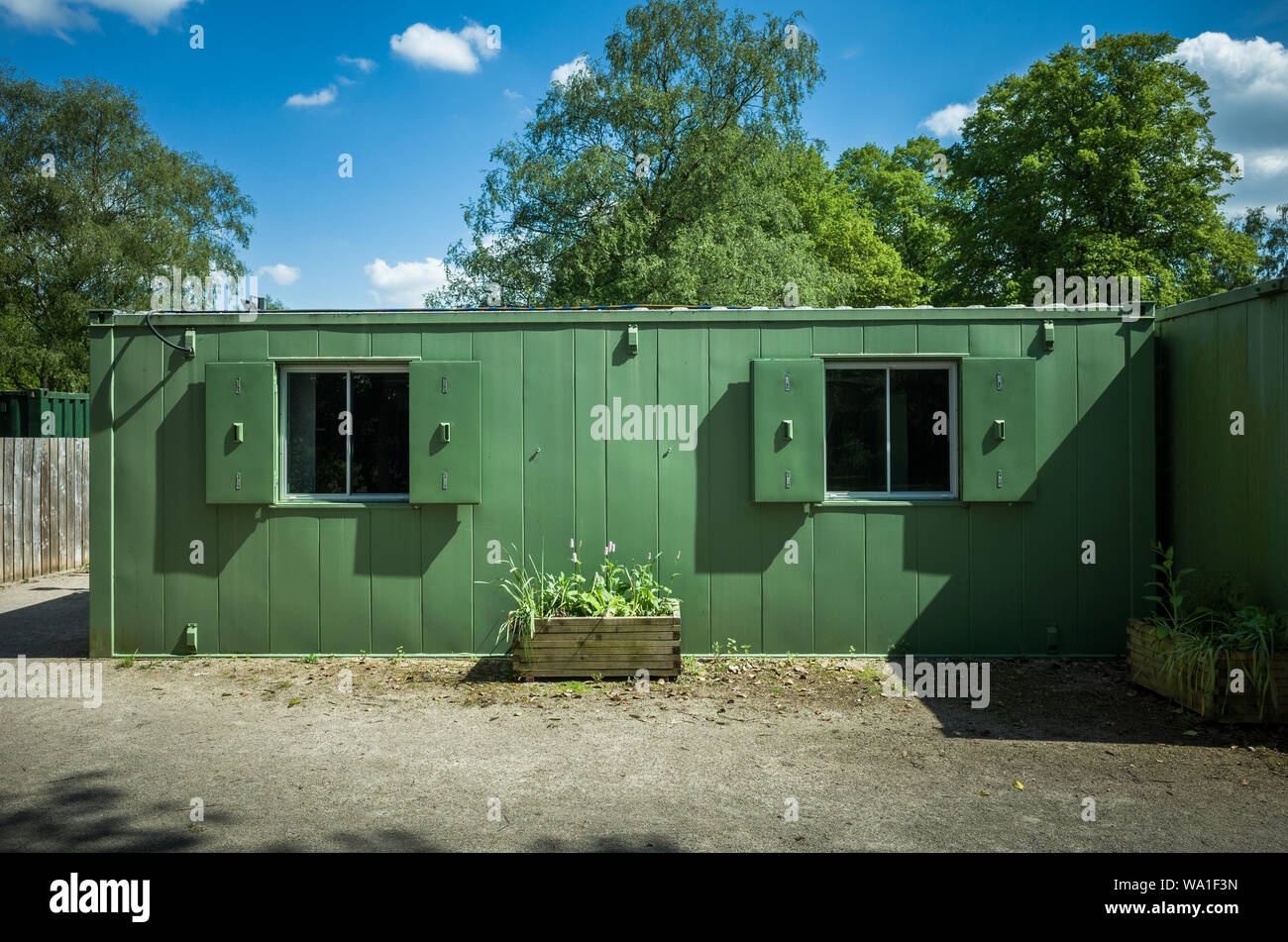 Un mobile statico edificio verde in un Country Park. Foto Stock