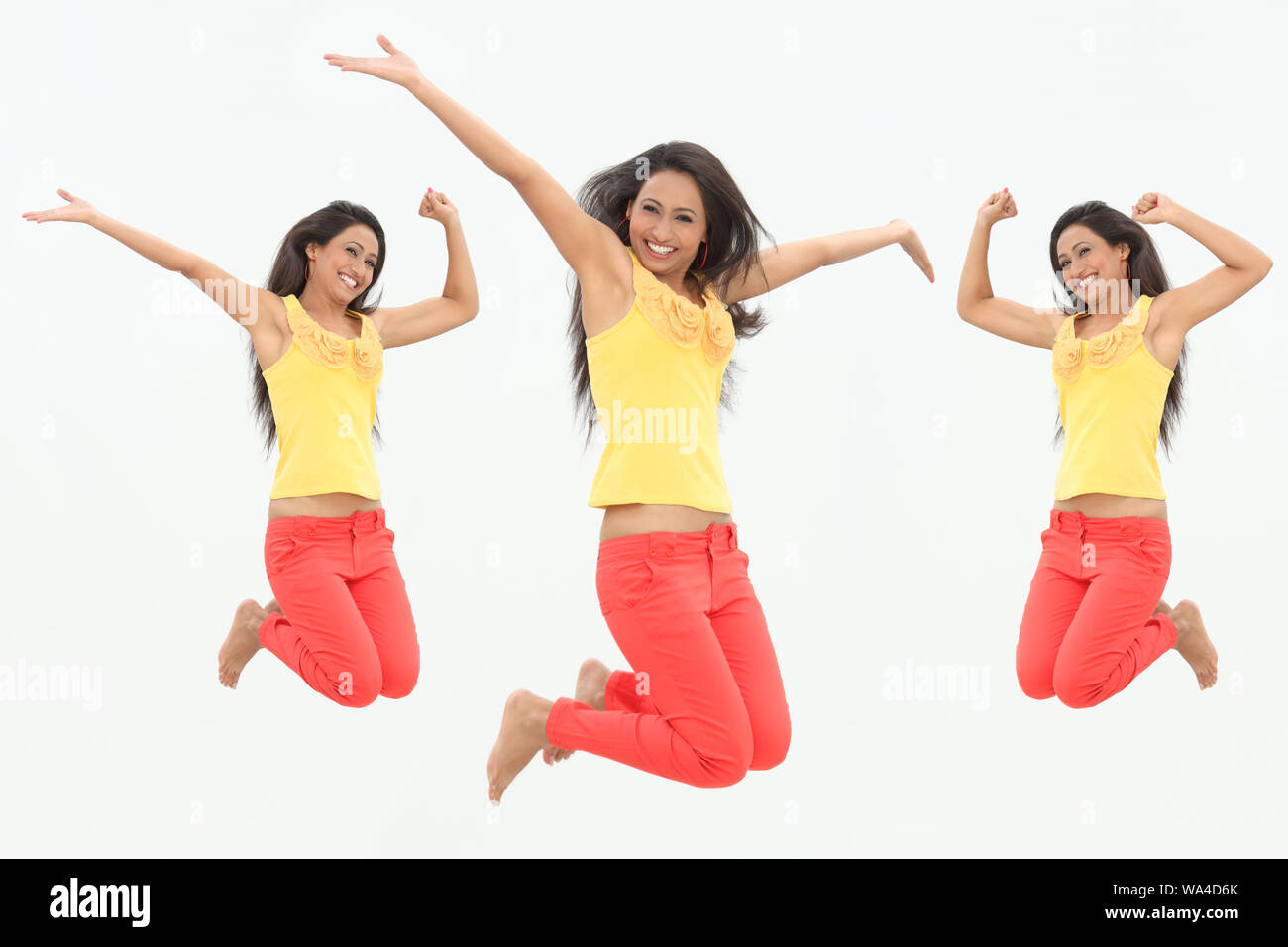 Immagini multiple di una giovane donna che salta in aria Foto Stock