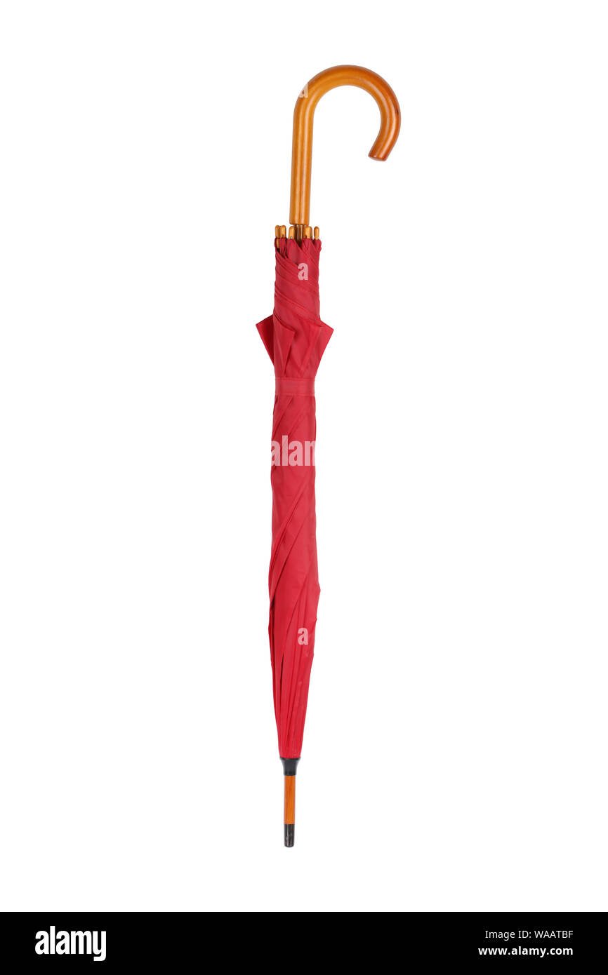 Una chiusura ombrello rosso isolato su bianco con tracciato di ritaglio Foto Stock