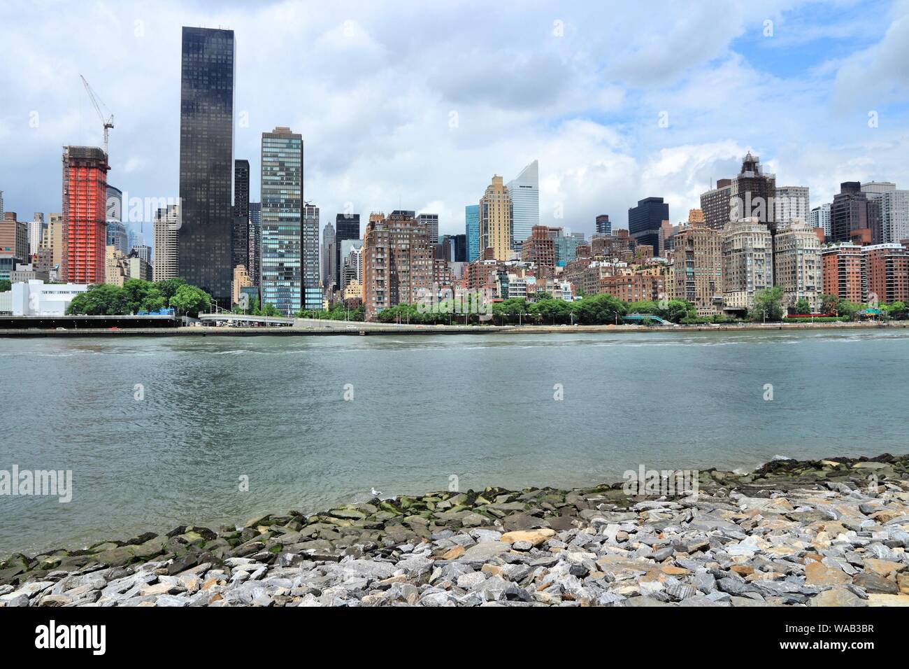 Midtown East, New York City, Stati Uniti d'America - skyline di Manhattan con East River. Foto Stock