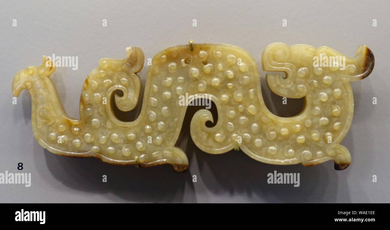 Il Dragone e la configurazione di uccelli, Cina, periodo di Stati belligeranti, 5th-4secolo BC, nephrite Foto Stock