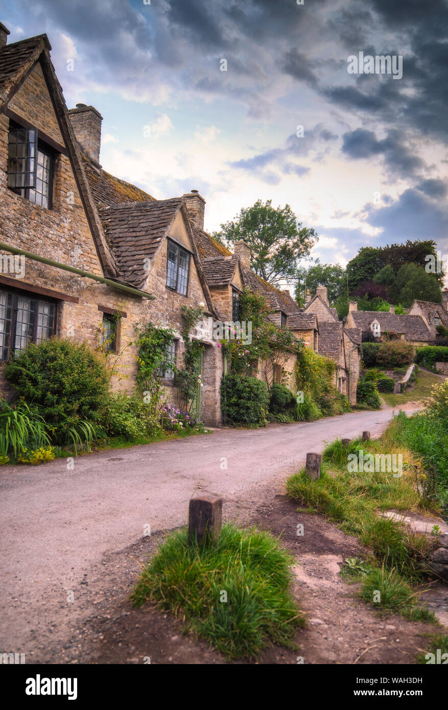 Cottage sulla fila di Arlington a Bibury, Gloucestershire in Cotswolds, England, Regno Unito Foto Stock