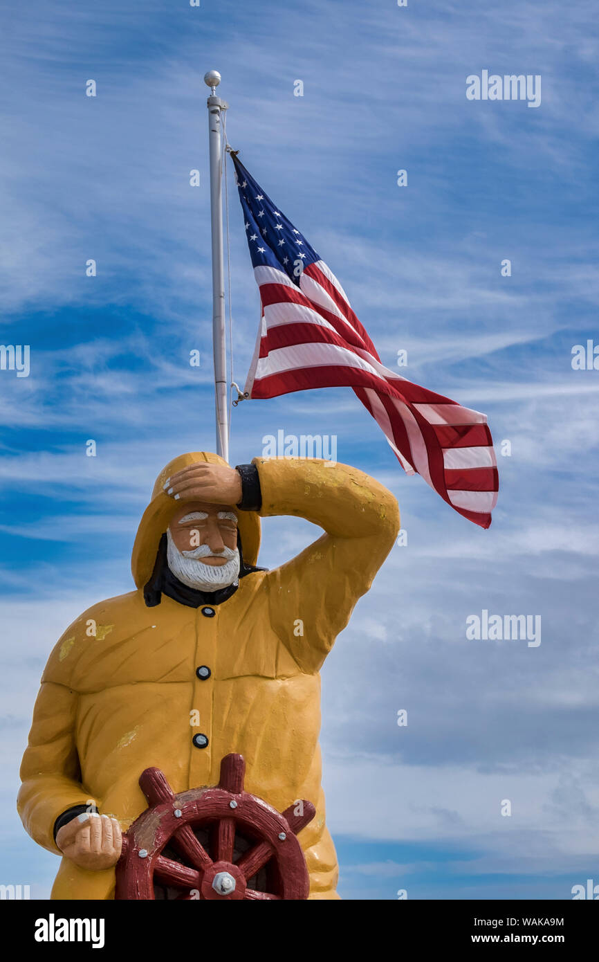 Fisherman statua fuori Goodrich a base di frutti di mare, Oak Hill, Florida, Stati Uniti d'America Foto Stock