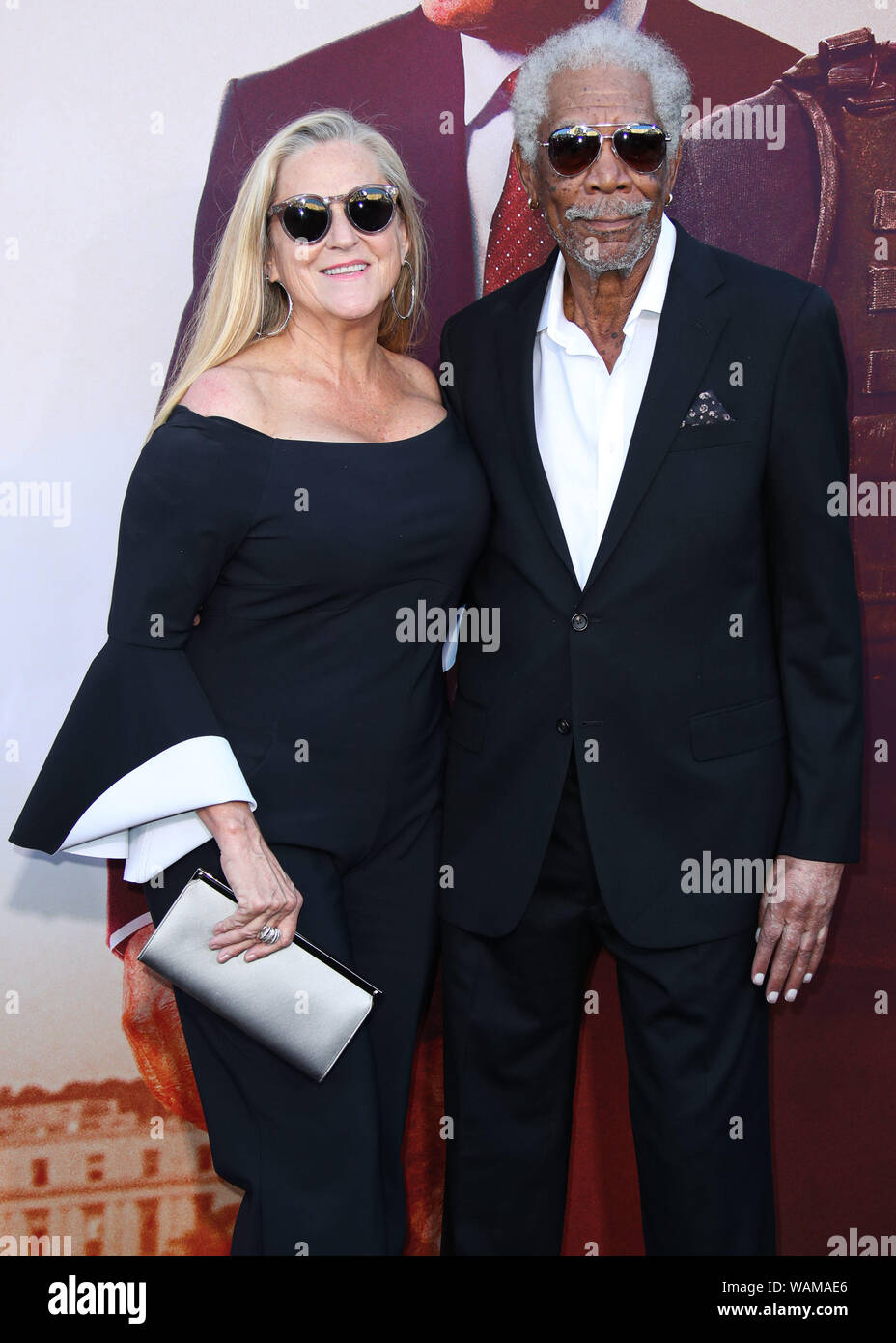 WESTWOOD, Los Angeles, California, Stati Uniti d'America - 20 agosto: Produttore Lori McCreary e attore Morgan Freeman di arrivare presso il Los Angeles Premiere di Lionsgate 'Angelo Caduto" tenutasi presso il Regency Village Theatre il 20 agosto 2019 a Westwood, Los Angeles, California, Stati Uniti. (Foto di Xavier COLLIN/Image Press Agency) Foto Stock