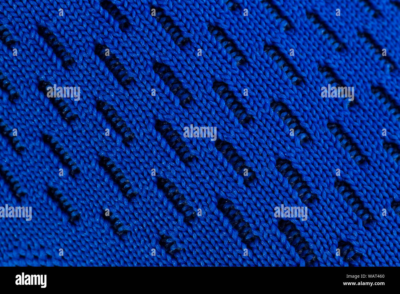 Frammento di un panno blu sneaker. La consistenza del materiale di calzature sportive Foto Stock