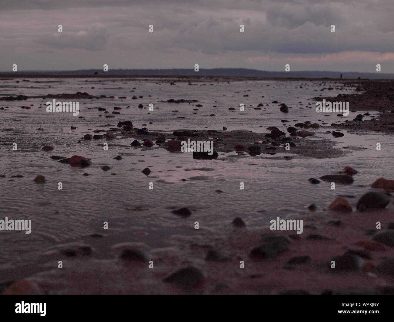 Gli scatti di spiaggia Talacre Lighthouse al tramonto nel mese di agosto Foto Stock