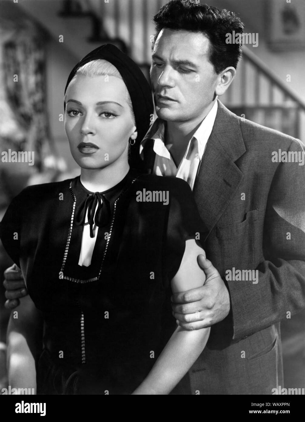LANA TURNER e John Garfield nel postino anelli SEMPRE DUE VOLTE (1946), diretto da Tay Garnett. Credito: Paramount Pictures / Album Foto Stock