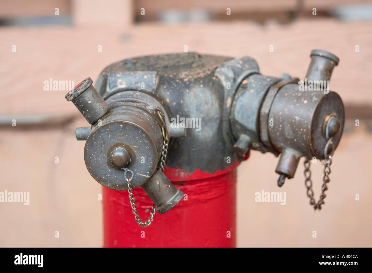 Red idrante di fuoco su un marciapiede Foto Stock
