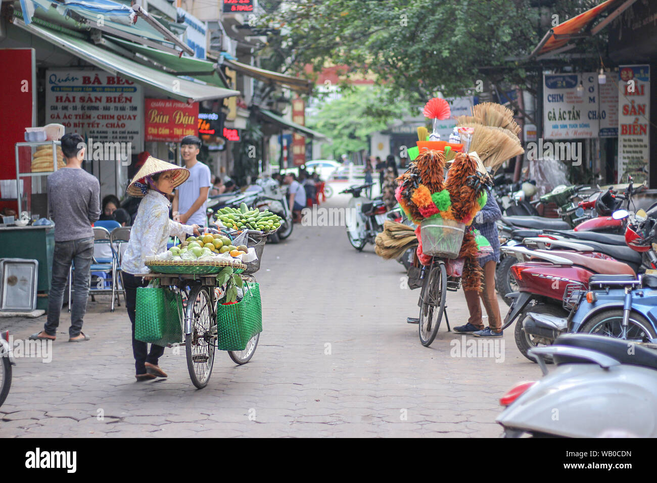 I venditori ambulanti di Hanoi, Vietnam Foto Stock