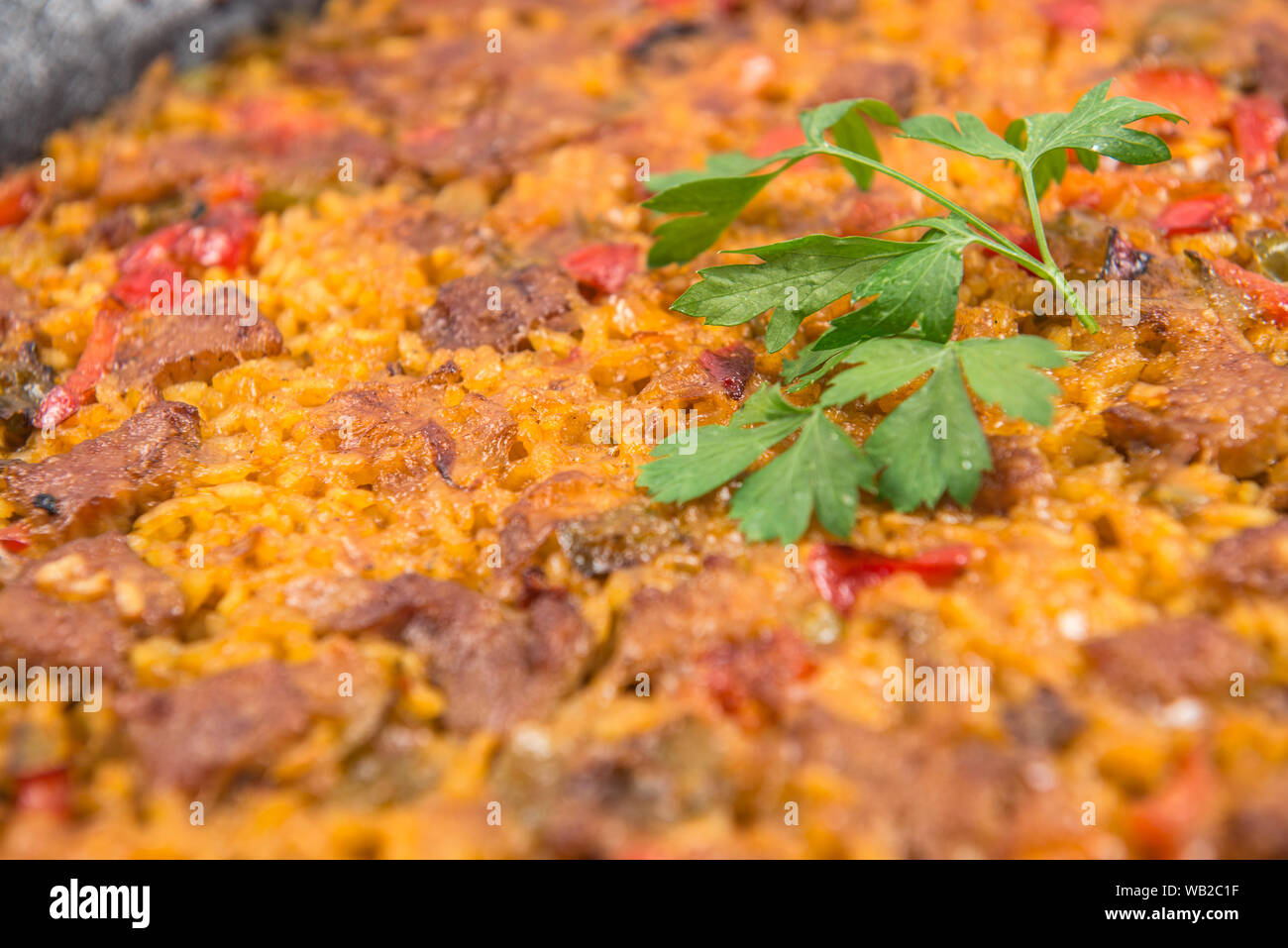 Riso con carne di maiale iberico nervature Foto Stock