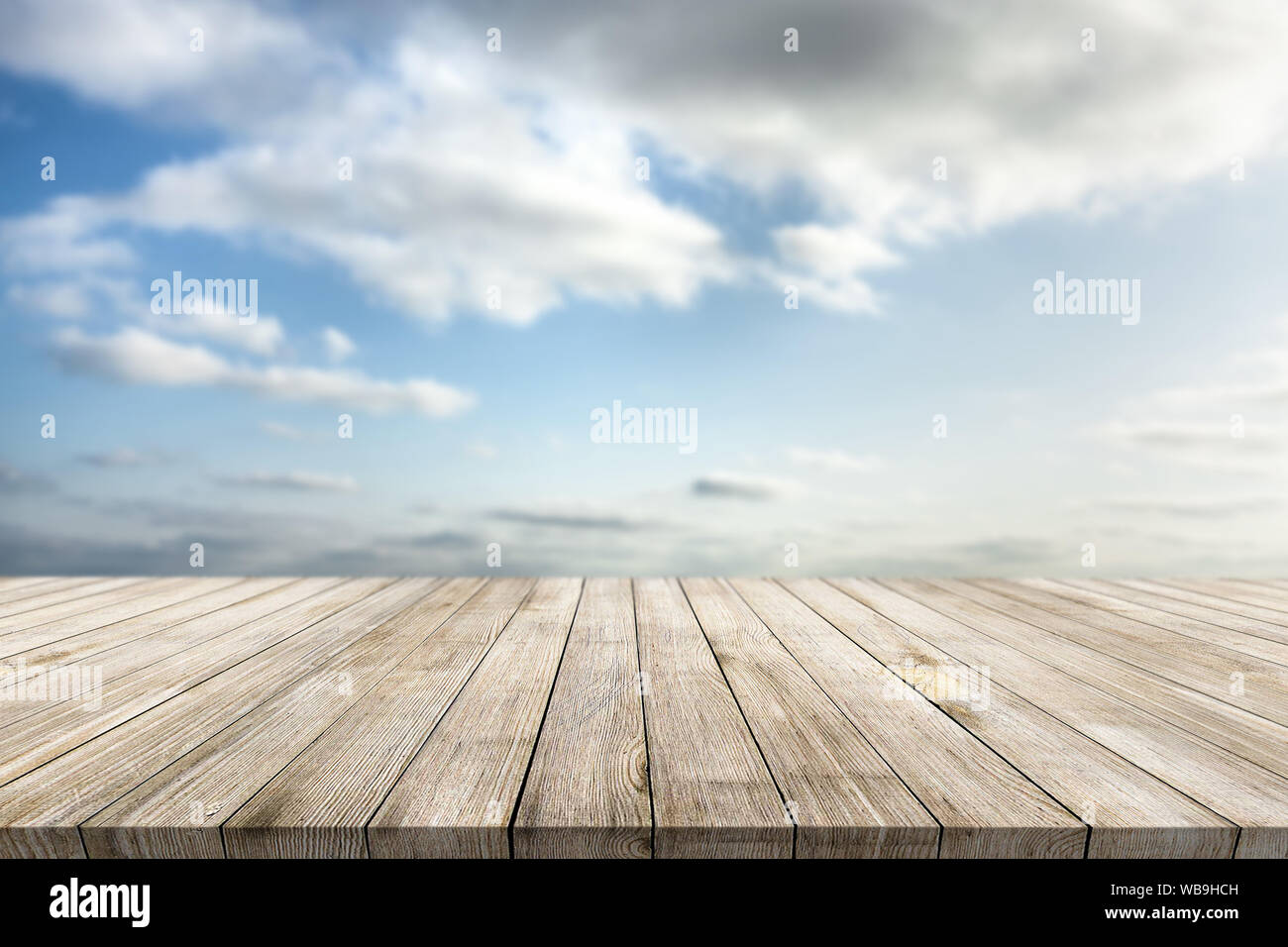 Abstract di sfocatura dello sfondo bokeh di fondo con scrivania in legno Foto Stock