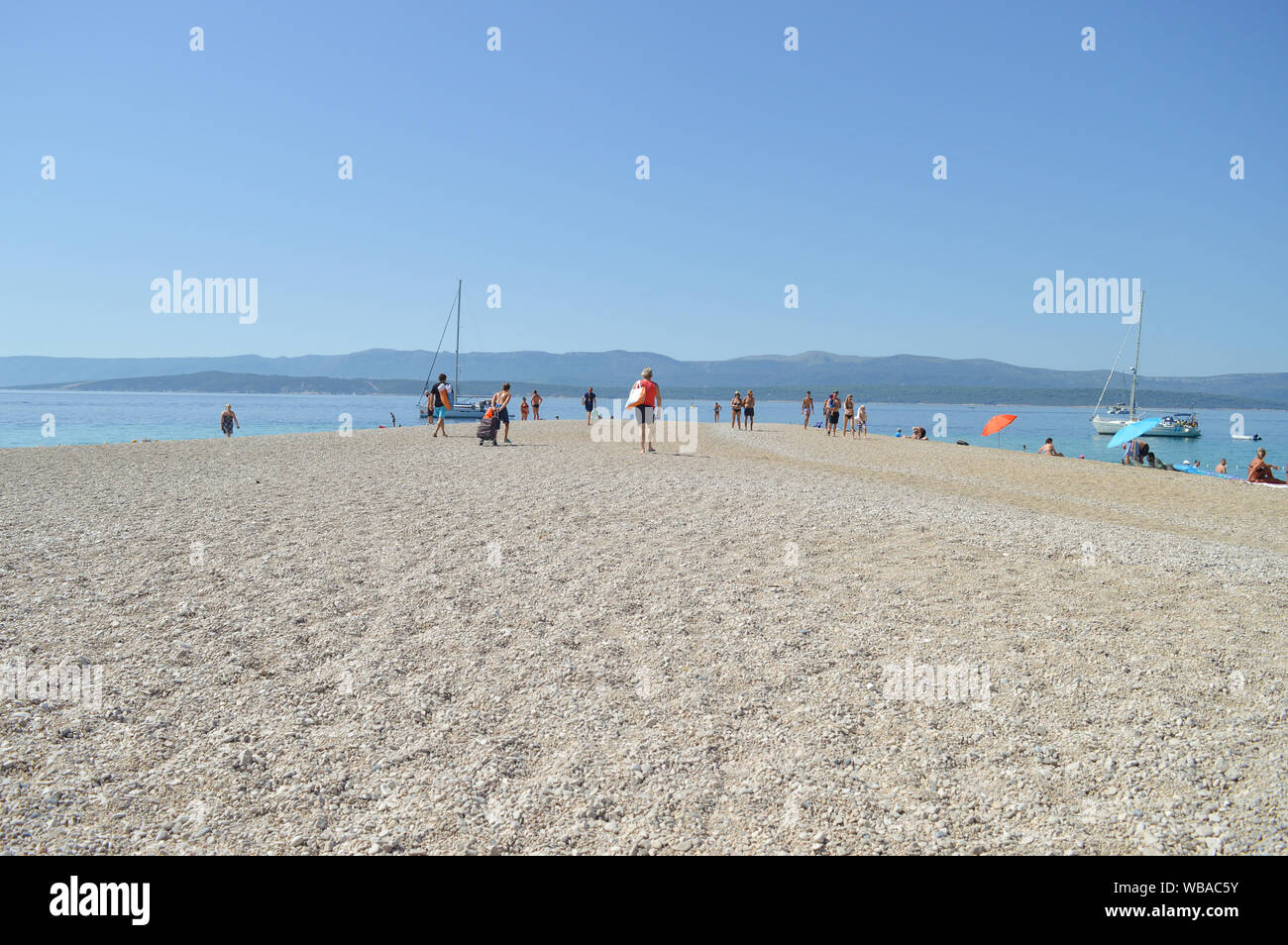 La famosa spiaggia di ciottoli di Zlatni rat vicino a Bol, isola di Brac Foto Stock