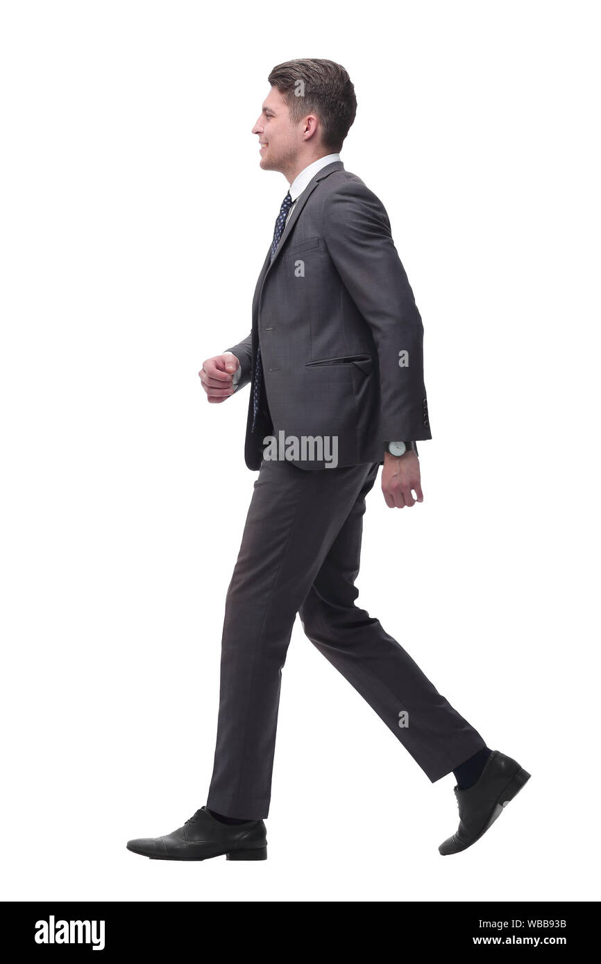 Executive giovane impreditore con fiducia va avanti. isolato su bianco Foto Stock