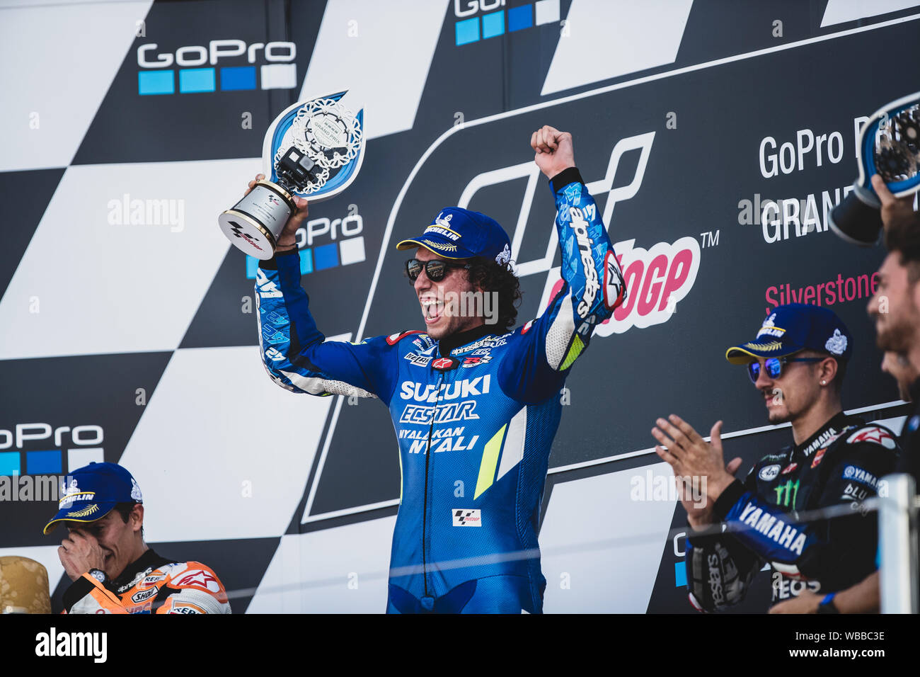 Alex Rins champagne sul podio, Ecstar Suzuki, Silverstone MotoGP, Silverstone 2019 GoPro British Grand Prix Foto Stock