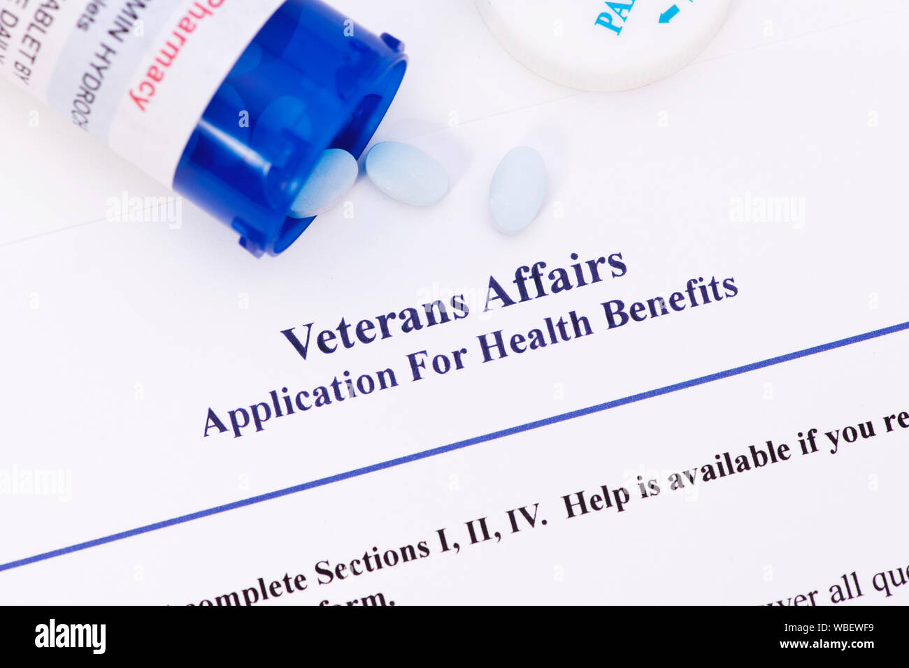 Applicazione per i veterani dei vantaggi. Etichetta e documento creato dal fotografo. Foto Stock