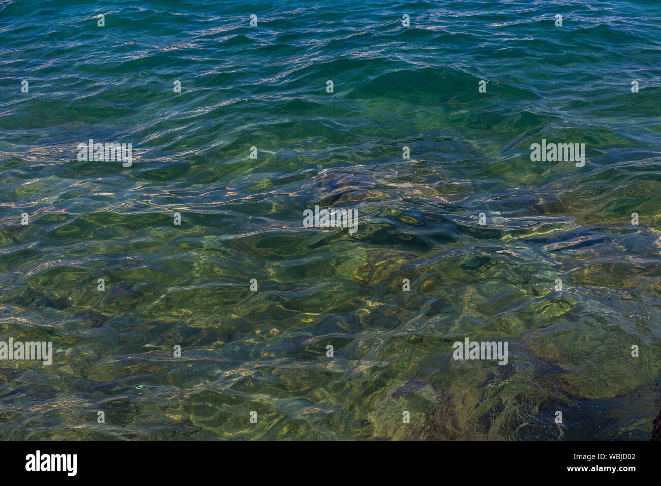 Colpo di sfondo di aqua di mare superficie di acqua Foto Stock