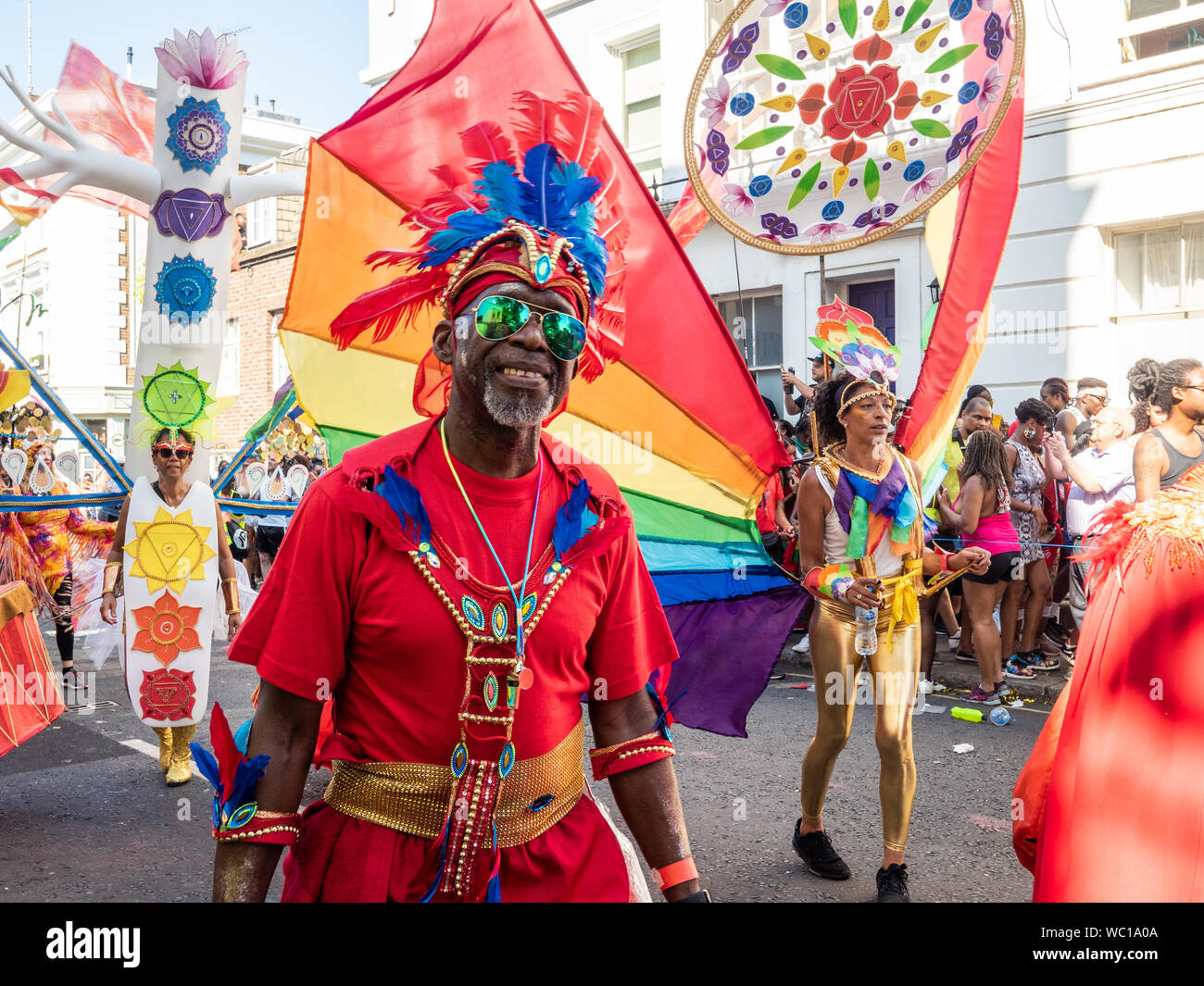 Ragazzo con un grande sorriso al Notting Hill Carnival London Foto Stock