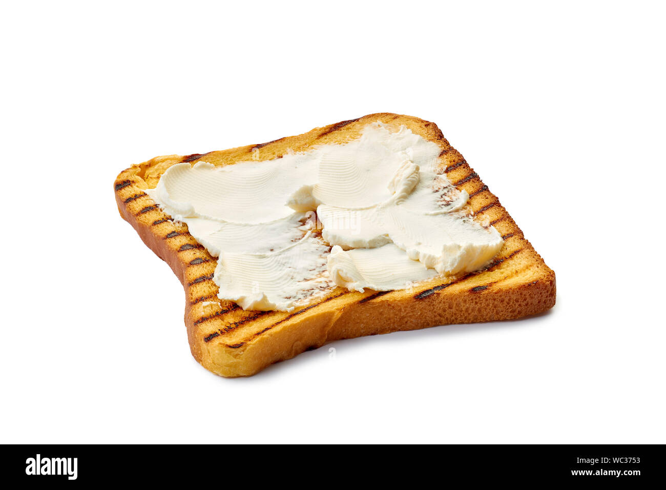 Arrosto di fetta di pane tostato con la crema di formaggio su bianco Foto Stock